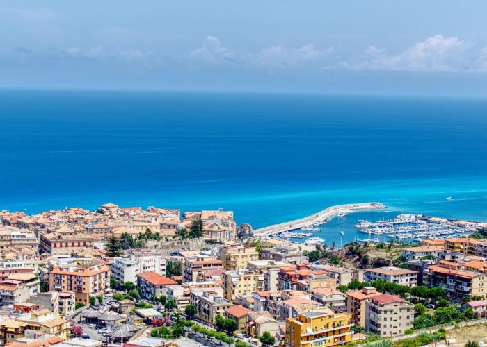 Colorful coastal houses and the bright blue Tyrrhenian sea in Tropea, Calabria. Photo: Nemanja Peric